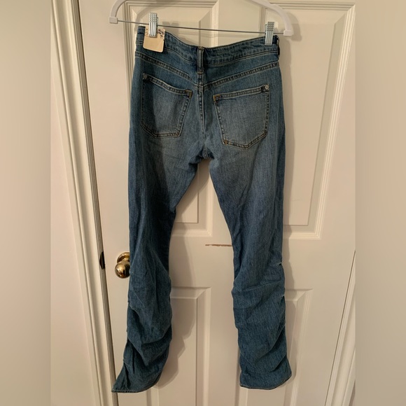 Low rise icon flare mid wash jeans by Anthropologie. - Picture 2 of 4